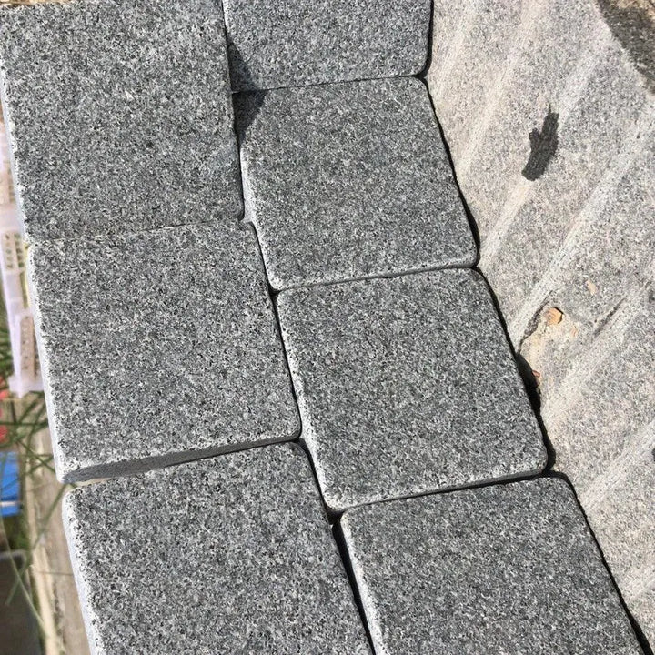 graphite grey granite setts, sawn and flamed 100 x 100 x 30