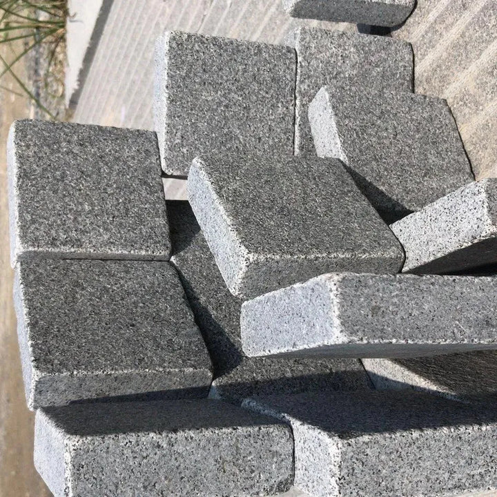 sawn granite setts. flamed mid grey 100 x 100 x 30